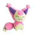 An officially licensed Skitty plush sitting upright with a happy expression, pink and cream fur, large ears, and a puffy pink tail