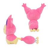 An officially licensed Skitty plush sitting upright with a happy expression, pink and cream fur, large ears, and a puffy pink tail