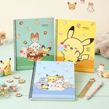 Three pastel-colored Pokemon Pokepeace spiral notebooks showcase adorable illustrations of Pikachu, Scorbunny, and other characters alongside cakes and sweets on green, yellow, and blue covers.
