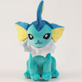 Pokemon Vaporeon Plush toy of a blue and yellow creature on a white background