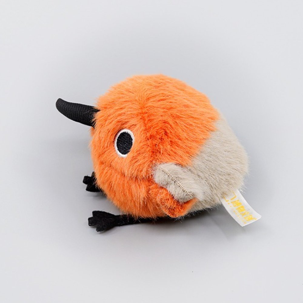 A round, fluffy Asian Dowitcher bird plush keychain with bright orange and tan fur, a black beak, and small black feet