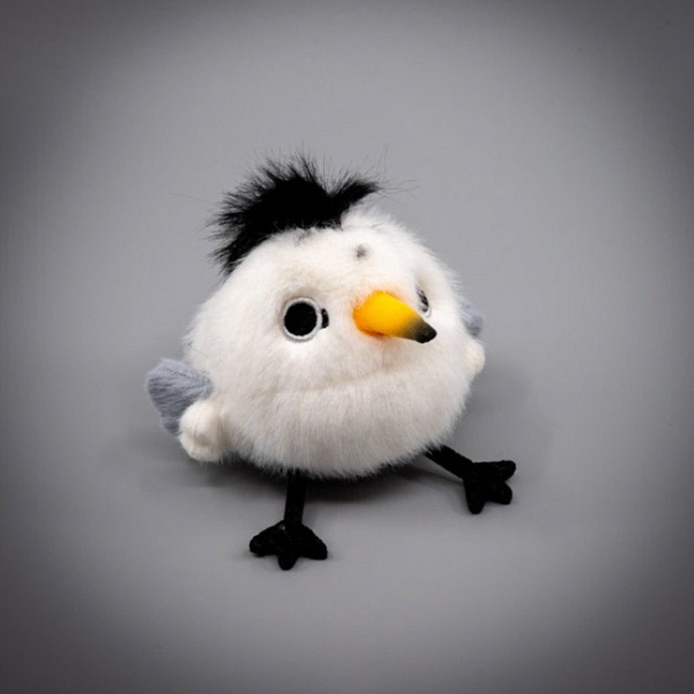 A round, fluffy white Chinese Crested Tern bird plush keychain with a spiky black crest, speckled body details, and a yellow-tipped beak