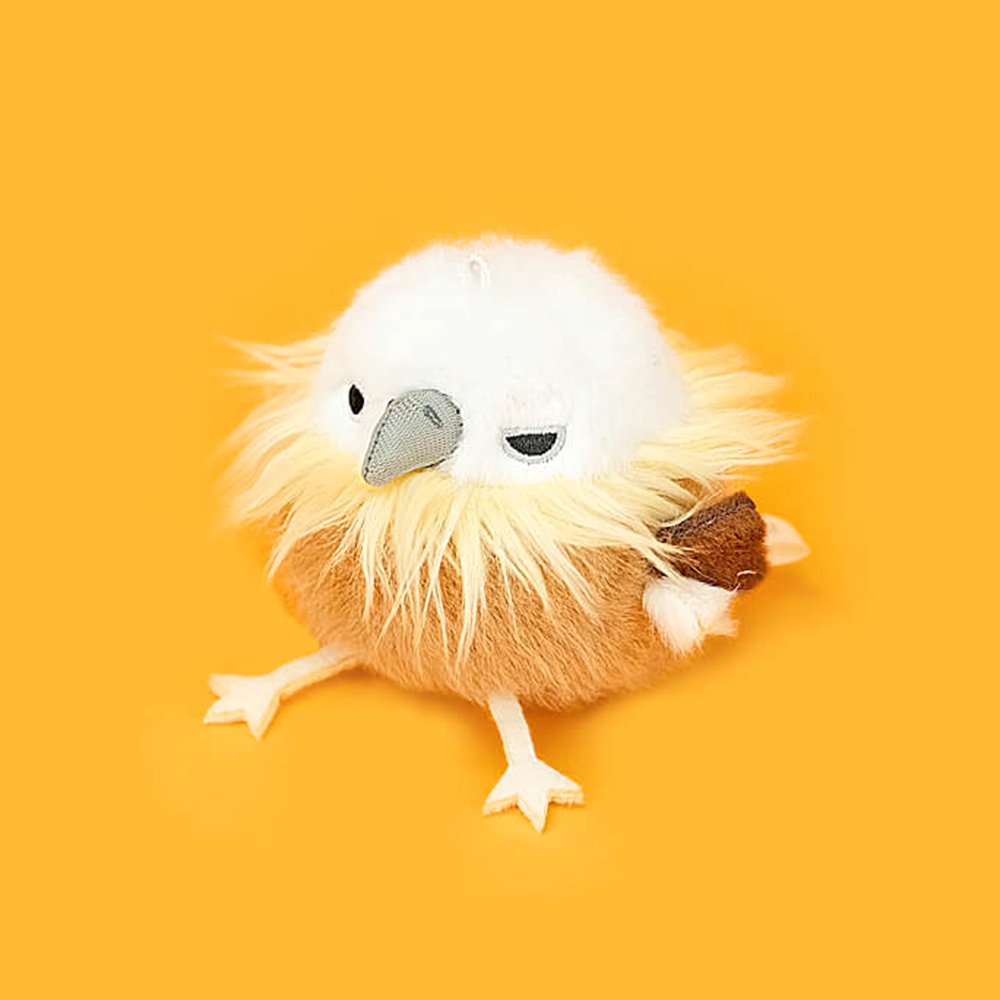 A round, fluffy Himalayan Vulture bird plush keychain with tan body fur, a white head and a striking shaggy ruff and a detailed grey beak