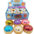 Six colorful, glittery Rainbow Mystery Squishy dumpling toys with cute cartoon faces sit inside mini plastic bun steamer baskets