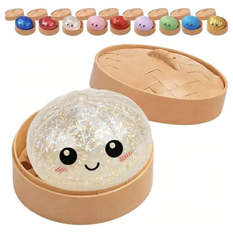Six colorful, glittery Rainbow Mystery Squishy dumpling toys with cute cartoon faces sit inside mini plastic bun steamer baskets