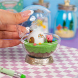 Officially licensed Kirby Terrarium Collection Deluxe Memories Re-Ment blind box figure featuring Kirby and Marx inside a clear globe alongside five other collectible jar and globe diorama displays