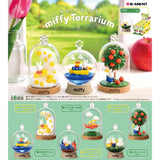 Officially licensed Miffy Terrarium Re-Ment blind box figures featuring clear globe and dome-encased miniature scenes including Miffy on a boat, under an apple tree, and sitting on a starry crescent moon