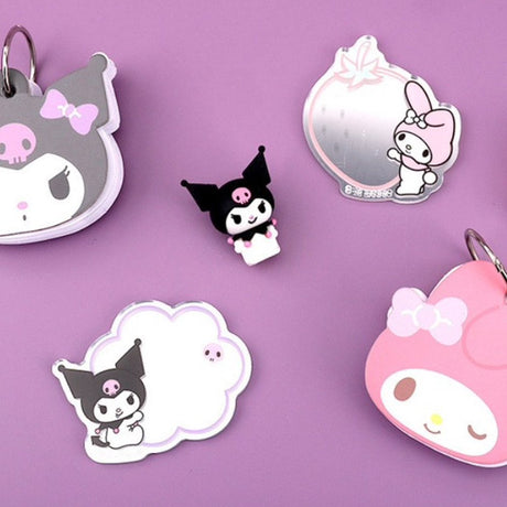 A collection of ten colorful, die-cut acrylic mirrors featuring officially licensed Sanrio characters like Hello Kitty, My Melody, and Cinnamoroll. Each mirror includes a character illustration next to a small reflective surface in various shapes like stars, clouds, and hearts.

