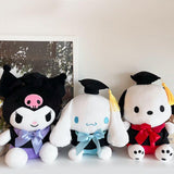 An officially licensed Sanrio Cinnamoroll, Kuromi, and Pochacco plush toys dressed in a black graduation cap with a gold tassel and a matching gown featuring a large bow