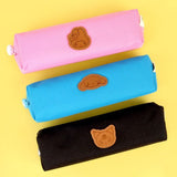 Three officially licensed Sanrio fabric pencil cases featuring stitched faux-leather character patches.
