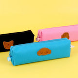 Three officially licensed Sanrio fabric pencil cases featuring stitched faux-leather character patches.