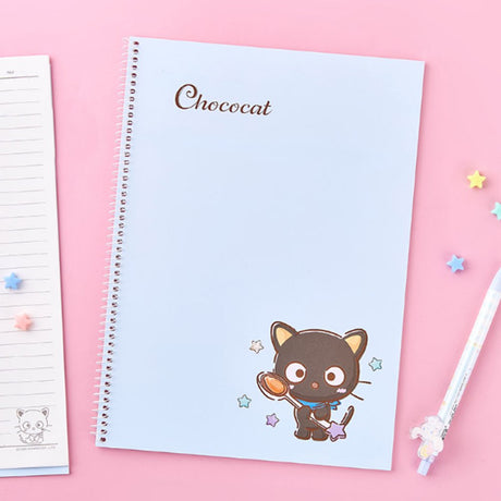 An officially licensed Sanrio three colorful spiral notebooks featuring Chococat, Hangyodon, and Usahana, comes with lined paper and a subtle character illustration in the bottom corner