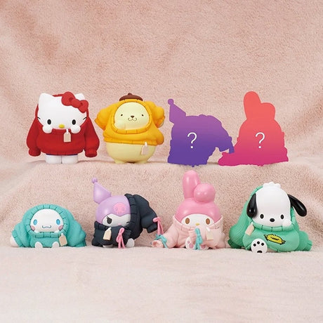 Officially licensed Sanrio Characters Okigaechu Figure Blind Box showing Sanrio characters bundled up in oversized knit sweaters