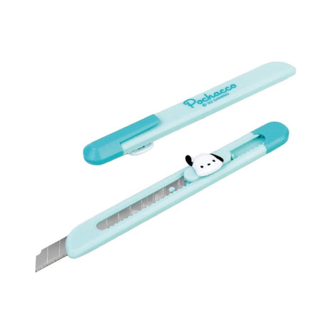 A collection of officially licensed Sanrio character pocket utility knives featuring Hello Kitty, Kuromi, My Melody, Pochacco, Pompompurin, and Cinnamoroll designs.