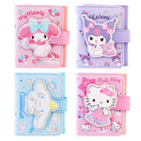 An officially licensed Sanrio collection of tri-fold wallets in pink, purple, and blue featuring large 3D padded appliqués of Hello Kitty, My Melody, Cinnamoroll, and Kuromi