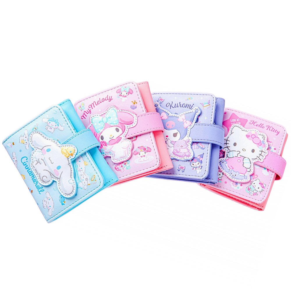 An officially licensed Sanrio collection of tri-fold wallets in pink, purple, and blue featuring large 3D padded appliqués of Hello Kitty, My Melody, Cinnamoroll, and Kuromi