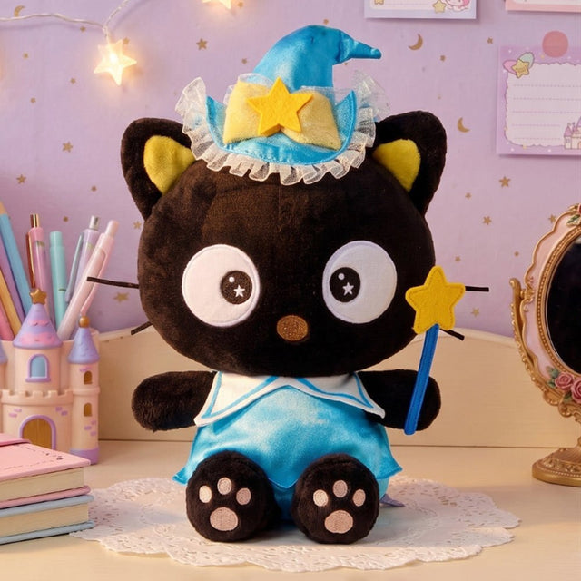Officially licensed Sanrio Chococat wizard plush toy wearing a blue magician hat with lace trim and holding a yellow star wand, featuring large star-eyed embroidered details and pink paw pads