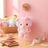 Officially licensed Sanrio Chococat pink tone plush keychain styled in dreamy pastel pink and soft white hues with color-matched embroidered features, dangling from a ball chain