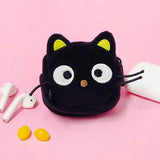 Sanrio Chococat pouch designed to look like a black cat with black body and yellow accents on the ears, eyes, and nose. The pouch has a zipper closure and a ballchain attachment.