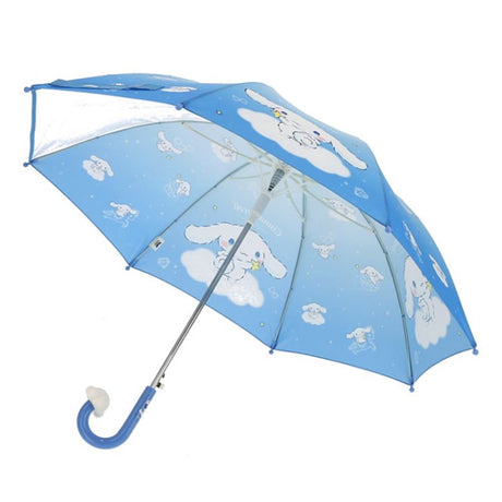Light blue Sanrio Cinnamoroll kids' umbrella featuring a gradient canopy with one clear see-through safety panel, finished with a 3D Cinnamoroll J-handle.