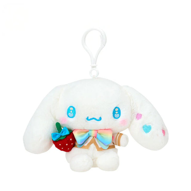 White Cinnamoroll  plush keychain with a strawberry and rainbow bow on a white background
