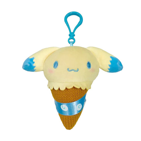 An officially licensed Sanrio Cinnamoroll plush keychain designed as an ice cream cone. The plush features a yellow scoop with blue-tipped ears, a textured brown cone with a blue ribbon, and a matching blue plastic clip.