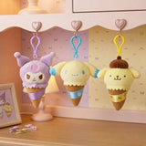 A collection of officially licensed Sanrio plush keychains featuring Kuromi, Cinnamoroll, and Pompompurin as ice cream cones with colorful scoops, textured cones, and matching plastic clips.