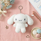 An officially licensed Sanrio fluffy monochromatic tone of grey and white Cinnamoroll plush keychain with a silver metal keychain