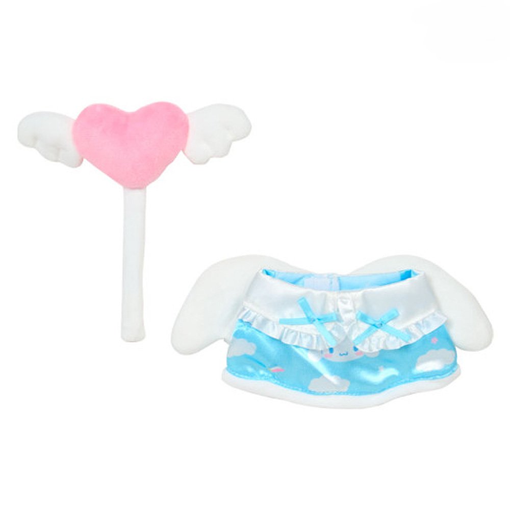 A Sanrio Pitatto Friends M-size doll outfit called the "Angel Set". The set includes a light blue satin dress with cloud and rainbow prints, white ruffles, and blue bows. Above the dress is a pink plush heart with white wings on a stick. Large white plush wings are shown behind the dress.