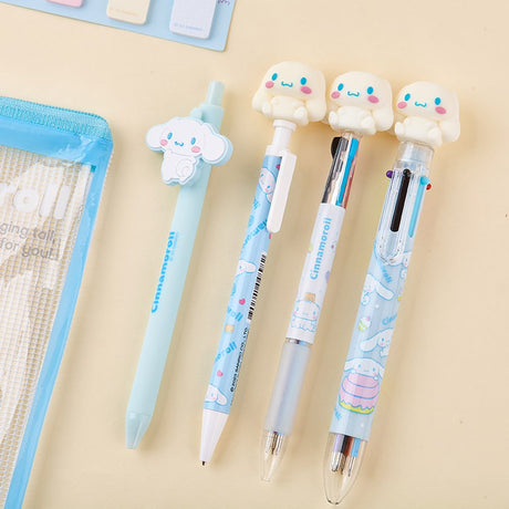 Officially licensed Sanrio Cinnamoroll stationery set featuring a clear zipper pouch, character-topped pens, sticky index memos, memo pad, random strap keychain, and a themed ruler.