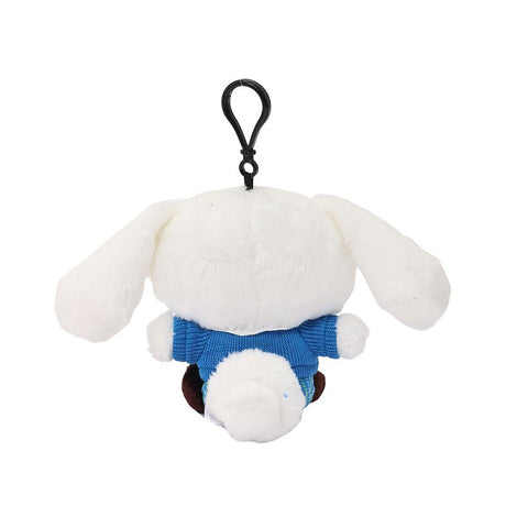 Officially licensed Cinnamoroll bag clip  plush doll wearing a  in a school uniform. He wears a blue plaid skirt, a V-neck blue sweater, a yellow tie. Perfect size to attach to your backpack, bag, purse, car, or pants. Ideal collectible toy for fans and Sanrio enthusiasts.