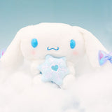 Magical Cinnamoroll Snow Angel plush sitting on soft clouds against a light blue background, creating a serene winter scene