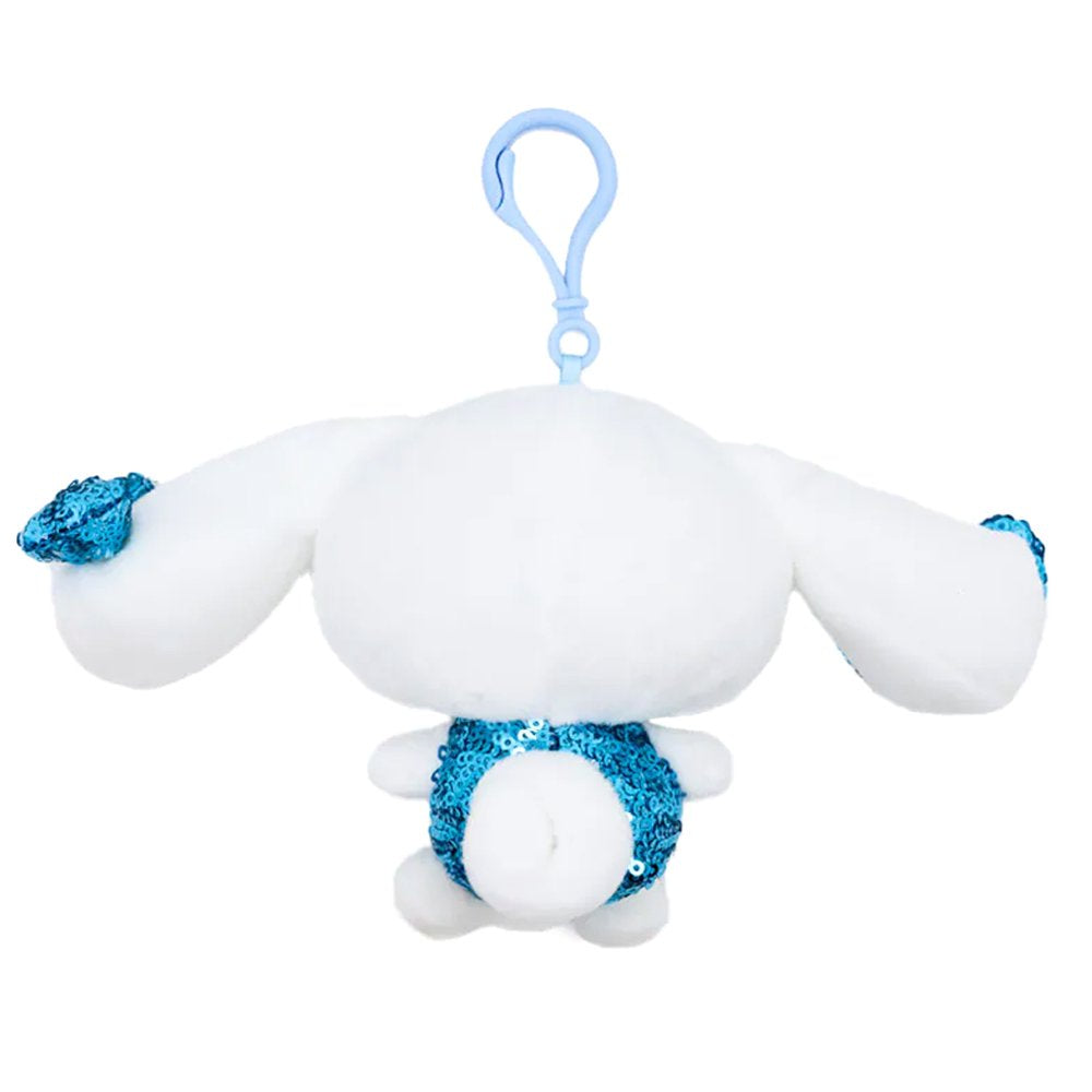Officially licensed Cinnamoroll Spangle Edition plush keychain featuring Cinnamoroll plush with blue sequined ear bows, a blue sequined outfit, and a pastel blue plastic clip