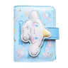 An officially licensed Sanrio collection of tri-fold wallet blue featuring large 3D padded appliqués of Cinnamoroll