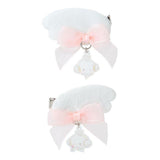 Two Cogimyun white hair angel wing bows with pink centers on a white background