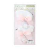 Packaged Cogimyun hair clip set with a bow and bear charm on a white background