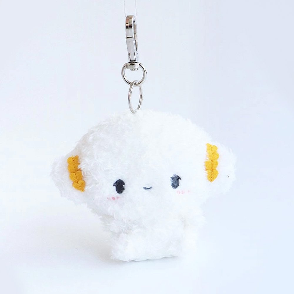 Sanrio Cogimyun Plush keychain with a cute face design on a white background. Ideal as collectible bag charms and accessories.