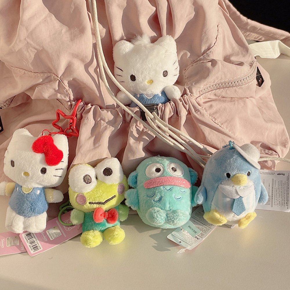 Sanrio plush keychain set including Hello Kitty, Keroppi, Hangyodon, and Tuxedosam, suitable for bag charms and collectible Sanrio merchandise.