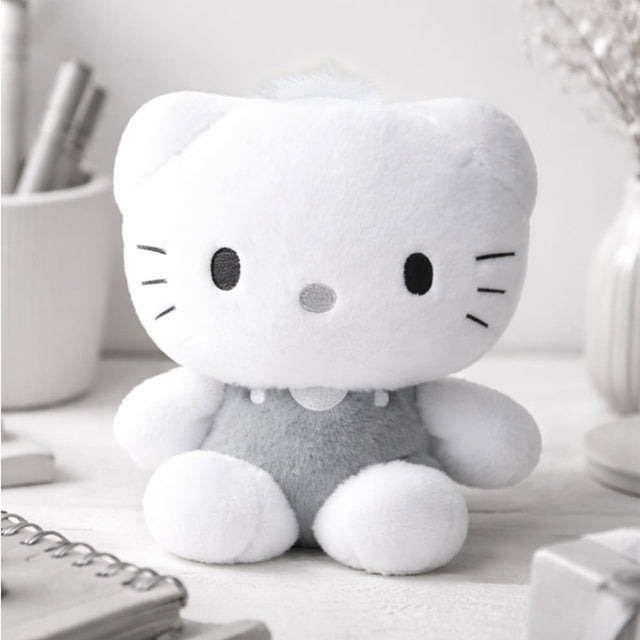 An officially licensed Sanrio Dear Daniel plush doll dressed in a grey outfit