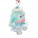 An officially licensed Sanrio Hangyodon plush keychain featuring the character in a teal ballerina tutu and polka-dot bodice with a yellow star accent. The plush includes fluffy white head trim, angel wings, and a white plastic clip for easy attachment.
