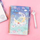 An officially licensed Sanrio Hangyodon spiral-bound notebook, featuring a glitter finish with gold stars and an illustration of Hangyodon. Includes four distinct, colorful dividers and five different interior page designs.