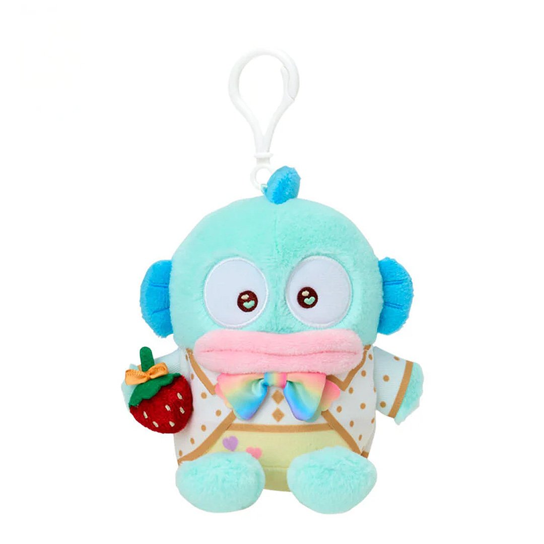 Officially licensed by Sanrio Hangyodon dressed in elegant white outfits with gold polka dots and vibrant rainbow bows, this large cast of beloved he is holding a velvet strawberry and features detailed embroidered heart accents in eyes their eyes. Perfect for adding a nautical touch of kawaii style to your bag, keys, or backpack.