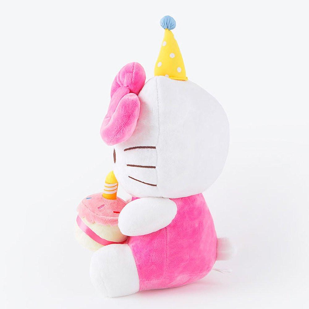 Officially licensed Sanrio Cute Hello Kitty plush wearing a party hat, holding a cake.