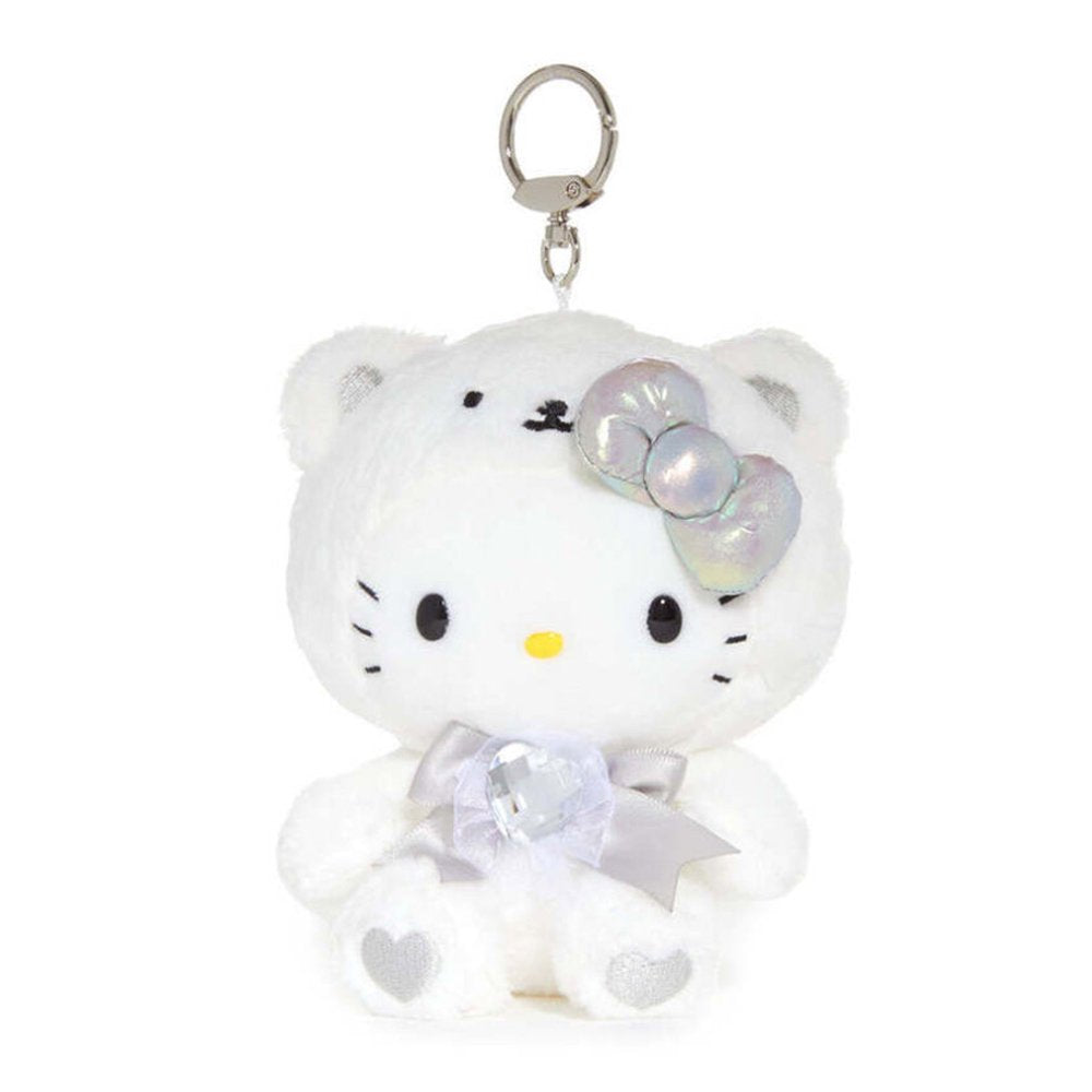 An officially licensed Sanrio Hello Kitty April birthstone plush keychain clip wearing a white bear hood, an iridescent silver bow, and a silver ribbon with a heart-shaped faux gemstone.