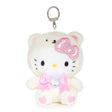 An officially licensed Sanrio Hello Kitty June birthstone plush keychain clip wearing a cream white bear hood, a metallic pink bow, and a pink ribbon with a heart-shaped faux gemstone.