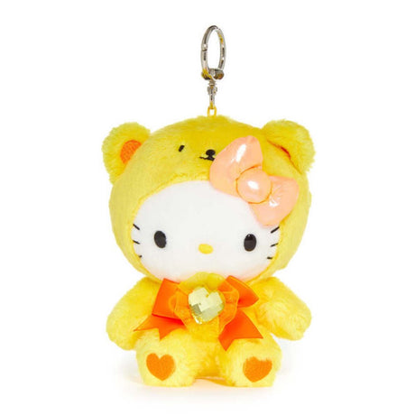An officially licensed Sanrio Hello Kitty November birthstone plush keychain clip wearing a bright yellow bear hood, a metallic orange bow, and an orange ribbon with a heart-shaped faux gemstone.