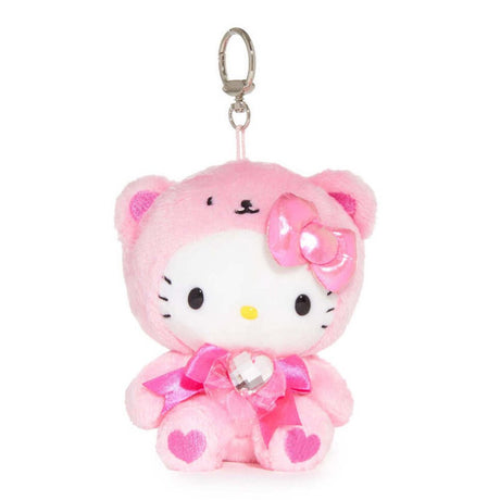 An officially licensed Sanrio Hello Kitty October birthstone plush keychain clip wearing a baby pink bear hood, a metallic pink bow, and a pink ribbon with a heart-shaped faux gemstone.