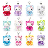 An officially licensed Sanrio Collection of 12 Hello Kitty birthstone plush keychains, each wearing a birthstone color matching hood, a bow, and a ribbon with a heart gem.