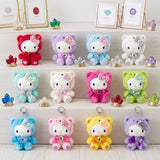 An officially licensed Sanrio Collection of 12 Hello Kitty birthstone plush keychains, each wearing a birthstone color matching hood, a bow, and a ribbon with a heart gem.