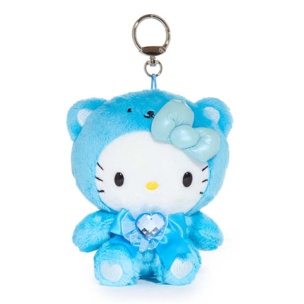 An officially licensed Sanrio Hello Kitty September birthstone plush keychain clip wearing a bright blue bear hood, a light-blue metallic bow, and a blue ribbon with a heart-shaped faux gemstone.